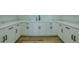 Stylish wet bar featuring custom cabinets, granite countertops, and modern fixtures at 3515 Powerline Rd, Lithia, FL 33547