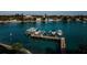 Aerial view showcasing boat docks set against the backdrop of beautiful blue water at 3805 Gulf Blvd # 504, St Pete Beach, FL 33706