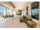 Enjoy outdoor living on this balcony furnished with wicker furniture at 3805 Gulf Blvd # 504, St Pete Beach, FL 33706