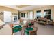 Enjoy outdoor living on this spacious balcony with comfortable furniture at 3805 Gulf Blvd # 504, St Pete Beach, FL 33706