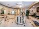 A luxurious bathroom boasts an island vanity, marble countertops, and a soaking tub at 3805 Gulf Blvd # 504, St Pete Beach, FL 33706