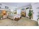 This bedroom displays a comfortable aesthetic with carpet, a bed, ceiling fan and other furnishings at 3805 Gulf Blvd # 504, St Pete Beach, FL 33706