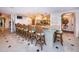 Spacious kitchen island with seating and granite countertops provides ample room for cooking and entertaining at 3805 Gulf Blvd # 504, St Pete Beach, FL 33706