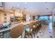 Gourmet kitchen with an island, granite countertops, stainless steel appliances, and ample counter space at 3805 Gulf Blvd # 504, St Pete Beach, FL 33706