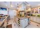 Gourmet kitchen features custom cabinetry, stainless steel appliances, and granite counters perfect for cooking at 3805 Gulf Blvd # 504, St Pete Beach, FL 33706