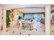Spacious living room with custom built-ins and water views at 3805 Gulf Blvd # 504, St Pete Beach, FL 33706