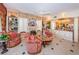Comfortable living room with a fireplace, built-in bookshelves, and inviting seating area at 3805 Gulf Blvd # 504, St Pete Beach, FL 33706