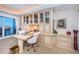 Dedicated office space featuring custom built-ins and ample storage, perfect for working from home at 3805 Gulf Blvd # 504, St Pete Beach, FL 33706
