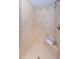 This shower showcases custom tile work with seashells, a mounted shower head and a built-in bench at 3805 Gulf Blvd # 504, St Pete Beach, FL 33706