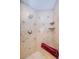 This shower boasts custom tile work, a mounted shower head, corner shelves and a built-in bench at 3805 Gulf Blvd # 504, St Pete Beach, FL 33706