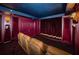 Home theater with plush seating, starry ceiling, and large screen for an ultimate entertainment experience at 3805 Gulf Blvd # 504, St Pete Beach, FL 33706