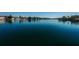 Expansive waterfront featuring calm blue water and lush coastline, creating a tranquil setting at 3805 Gulf Blvd # 504, St Pete Beach, FL 33706