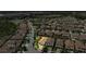 Birds eye view of the property and surrounding neighborhood, featuring manicured lawns and mature trees at 3877 Burdick Loop, Odessa, FL 33556