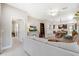 Inviting living room flowing into the dining area, creating an open and airy living space at 3877 Burdick Loop, Odessa, FL 33556