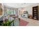 Comfortable living area with a sectional sofa and a TV console at 3877 Burdick Loop, Odessa, FL 33556