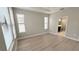 Spacious bedroom with lots of natural light and a bathroom en suite with walk-in shower at 4063 Medicci Ln, Wesley Chapel, FL 33543