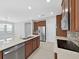 Contemporary kitchen with a large island, stainless steel appliances, and sleek cabinetry at 4063 Medicci Ln, Wesley Chapel, FL 33543