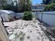 Fenced backyard with a shed at 4104 W North B St, Tampa, FL 33609
