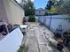 Fenced backyard with a shed at 4104 W North B St, Tampa, FL 33609