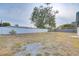 Expansive backyard features a vinyl fence and plenty of space for outdoor activities at 416 Flamingo Dr, Apollo Beach, FL 33572