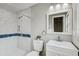 Updated bathroom with white marble shower, vanity, and modern fixtures at 416 Flamingo Dr, Apollo Beach, FL 33572