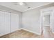 Bedroom featuring wood floors and a double door closet at 416 Flamingo Dr, Apollo Beach, FL 33572