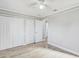Clean bedroom with wood floors and ample closet space at 416 Flamingo Dr, Apollo Beach, FL 33572
