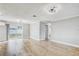 Spacious living area with wood flooring and bright, natural light at 416 Flamingo Dr, Apollo Beach, FL 33572