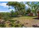 Large grassy backyard with a view of the waterway at 4512 24Th Ave S, Tampa, FL 33619