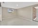 Minimal bedroom includes tile floors and natural light, with an exit to the sun room at 4512 24Th Ave S, Tampa, FL 33619