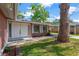 Inviting entryway and facade of this well-maintained, single story brick home at 4512 24Th Ave S, Tampa, FL 33619