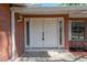 Close-up of the beautiful double front doors of this charming brick home at 4512 24Th Ave S, Tampa, FL 33619