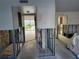 Unfinished interior space with exposed framing and views to an outdoor landscaped area at 4885 1St Ne St # 110, St Petersburg, FL 33703
