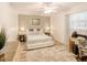 Inviting bedroom with decorative ceiling fan and neutral color palette at 5153 Miller Bayou Dr, Port Richey, FL 34668