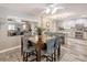 Open dining area with stylish seating, blending seamlessly into the modern kitchen at 5153 Miller Bayou Dr, Port Richey, FL 34668
