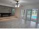 Open layout from living room to the pool creating bright and airy entertainment space at 5153 Miller Bayou Dr, Port Richey, FL 34668