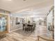 An open concept featuring dining area and kitchen offers a cohesive living space at 5153 Miller Bayou Dr, Port Richey, FL 34668