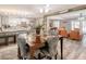 Open-concept living space with kitchen, dining area, living room, and billiards for seamless entertaining at 5153 Miller Bayou Dr, Port Richey, FL 34668