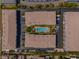Birds eye view of condos with a pool as well as condo parking at 521 Pinellas Bayway S # 301, St Petersburg, FL 33715