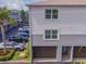 Inviting townhome exterior showing attached garages and convenient parking at 521 Pinellas Bayway S # 301, St Petersburg, FL 33715