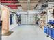Spacious garage with organizational systems and storage space for tools, equipment, and vehicles at 521 Pinellas Bayway S # 301, St Petersburg, FL 33715