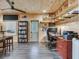 Cozy office features wood-paneled walls and built-in shelves for storage at 521 Pinellas Bayway S # 301, St Petersburg, FL 33715