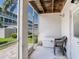 Enclosed lanai featuring a sitting area overlooking the community at 521 Pinellas Bayway S # 301, St Petersburg, FL 33715