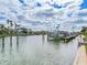 Picturesque waterfront view with boats docked, showcasing community's convenient access to boating and leisure at 521 Pinellas Bayway S # 301, St Petersburg, FL 33715