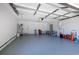 Spacious garage with painted floor and ample storage space at 5242 Venice Ne Way, St Petersburg, FL 33703