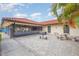 Community grilling and seating area, perfect for outdoor entertaining and gatherings with friends and neighbors at 5666 Gardens Dr # 202, Sarasota, FL 34243