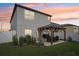 Lovely backyard with charming pergola, inviting setup for outdoor gatherings and comfortable lounging at 6398 Bar S Bar Trl, Zephyrhills, FL 33541