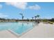 Inviting community pool with ample seating and serene surroundings, perfect for leisure and recreation at 6398 Bar S Bar Trl, Zephyrhills, FL 33541
