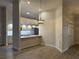Open dining room with view of kitchen featuring updated appliances and countertops at 6533 Brentwood Dr, Zephyrhills, FL 33542