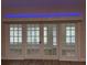 Office space featuring glass doors, neutral walls, wood floors and custom blinds at 6533 Brentwood Dr, Zephyrhills, FL 33542